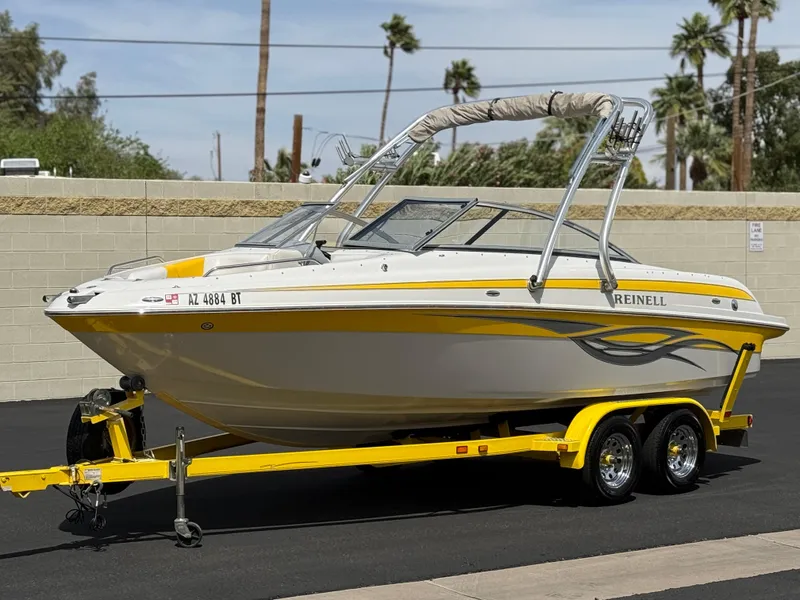 Slide: The Image of 2008 Reinell Bowrider 220LSE on yellow trailer, parked outdoors. - 38