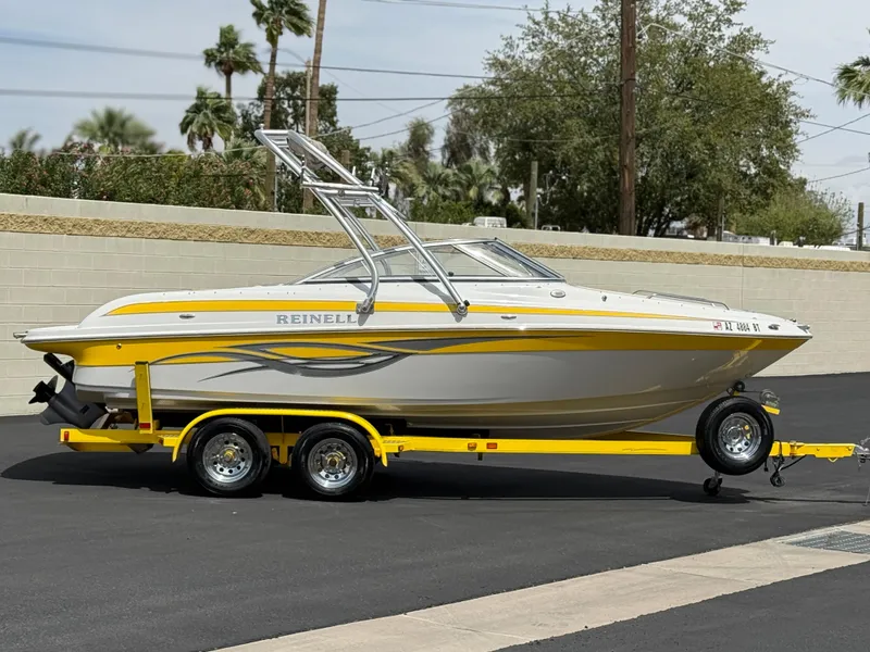 Slide: The Image of 2008 Reinell Bowrider 220LSE on yellow trailer, parked outdoors. - 39