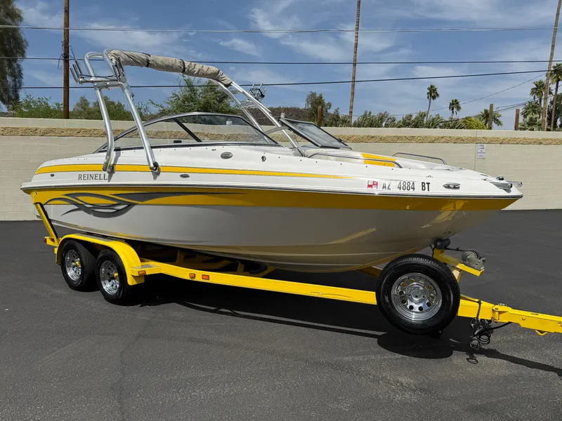 Slide: The Image of 2008 Reinell Bowrider 220LSE on yellow trailer, parked outdoors. - 40