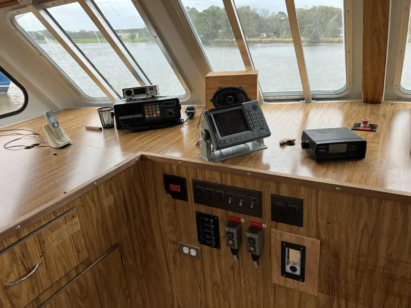 Slide: The Image of Bridge interior of a 1994 commercial offshore crew boat with navigation equipment. - 4
