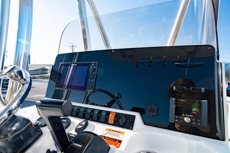 Slide: The Image of Control panel of 2018 Sea Hunt Triton 210 boat with navigation equipment. - 15