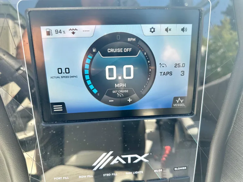 Slide: The Image of 2024 ATX Surf Boats 20 Type-S dashboard display showing speed and cruise control settings. - 14