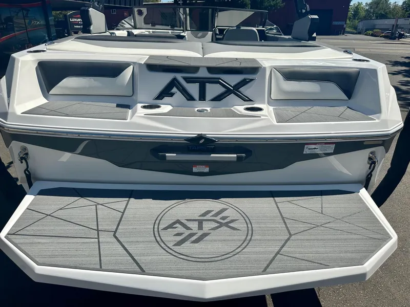 Slide: The Image of 2024 ATX Surf Boats 20 Type-S rear view with logo and swim platform. - 23