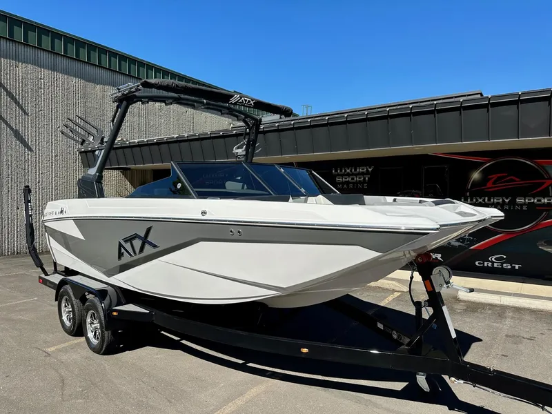 Slide: The Image of 2024 ATX Surf Boats 20 Type-S on trailer, displayed outdoors. - 27