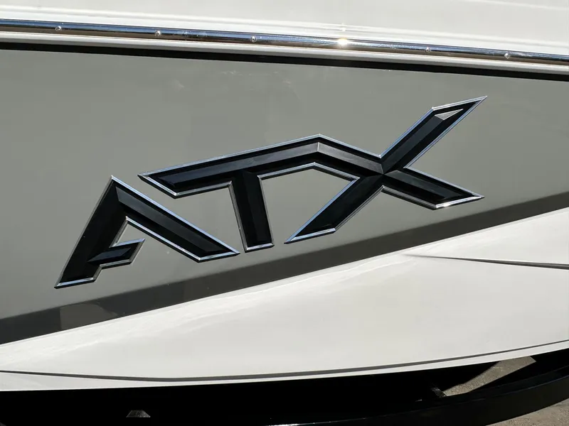Slide: The Image of 2024 ATX Surf Boats 20 Type-S logo on sleek gray and white hull. - 31