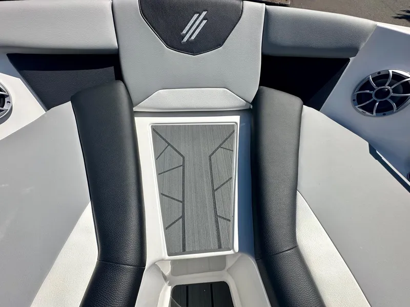 Slide: The Image of 2024 ATX Surf Boats 20 Type-S interior with sleek black and gray seating design. - 7