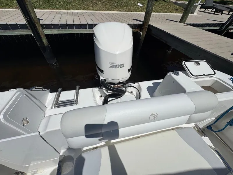 Slide: The Image of Edgewater 245 CX 2009 boat with Yamaha 300 outboard motor at dock. - 32