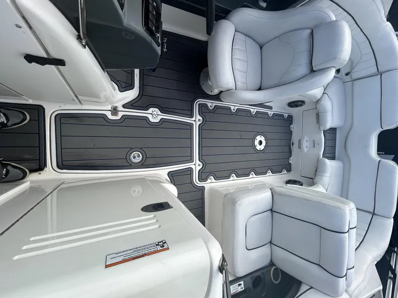 Slide: The Image of Interior of a 2007 Yamaha Boats SR-230, featuring sleek seating and modern design. - 7