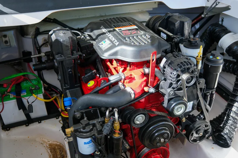 Slide: The Image of 2010 Four Winns 220H boat engine, detailed view of components and wiring. - 22