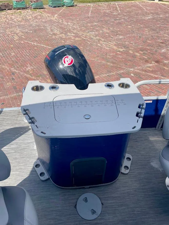 Slide: The Image of 2022 Bennington SX 23 Fishing boat with motor and seating area, ideal for angling adventures. - 15