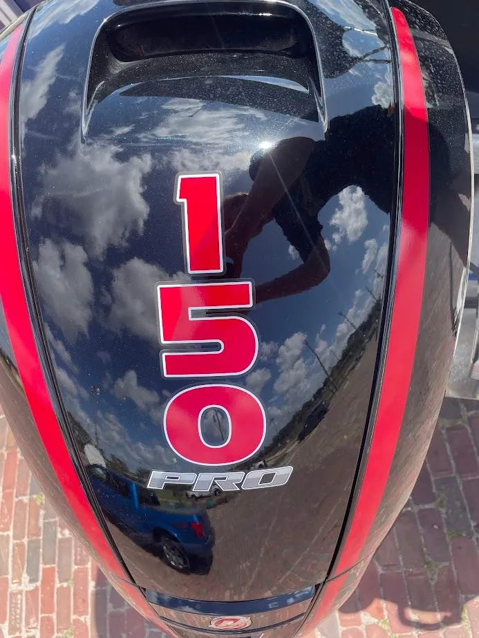 Slide: The Image of Outboard motor with "150 Pro" branding on a Bennington SX 23 Fishing boat, 2022 model. - 16