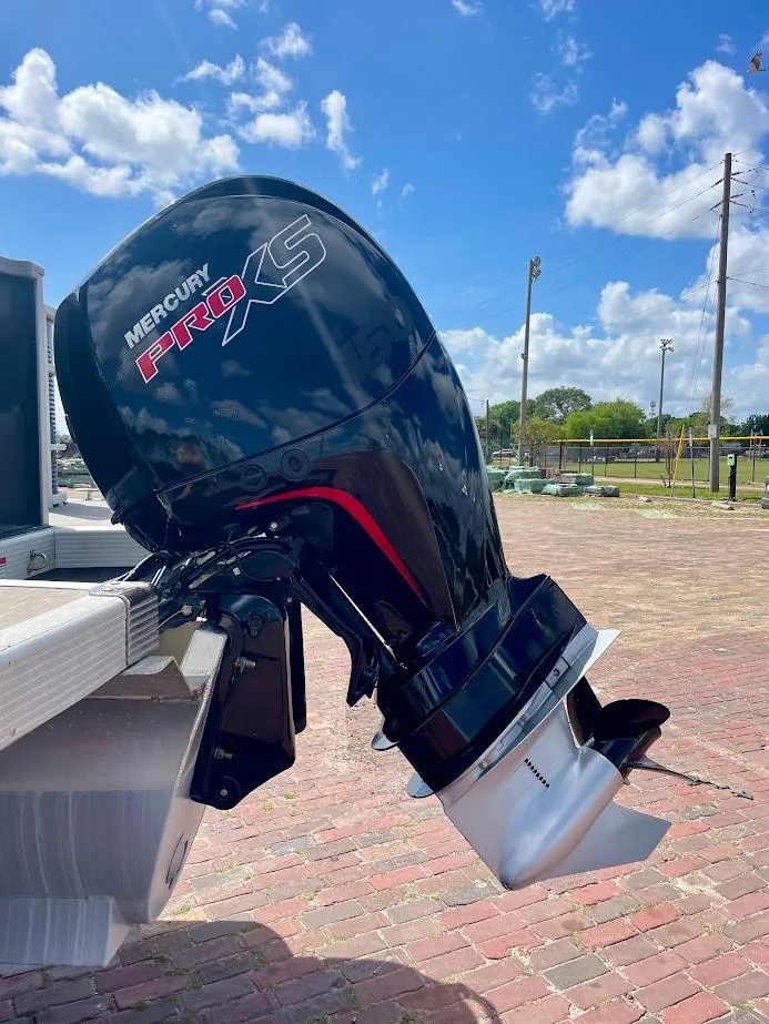Slide: The Image of 2022 Bennington SX 23 Fishing boat with Mercury Pro XS outboard motor. - 4