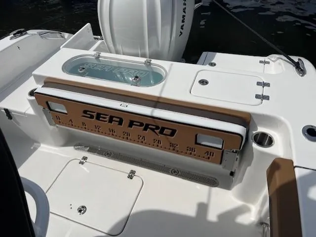 Slide: The Image of 2025 Sea Pro 242 Center Console boat interior with branded measuring board. - 5