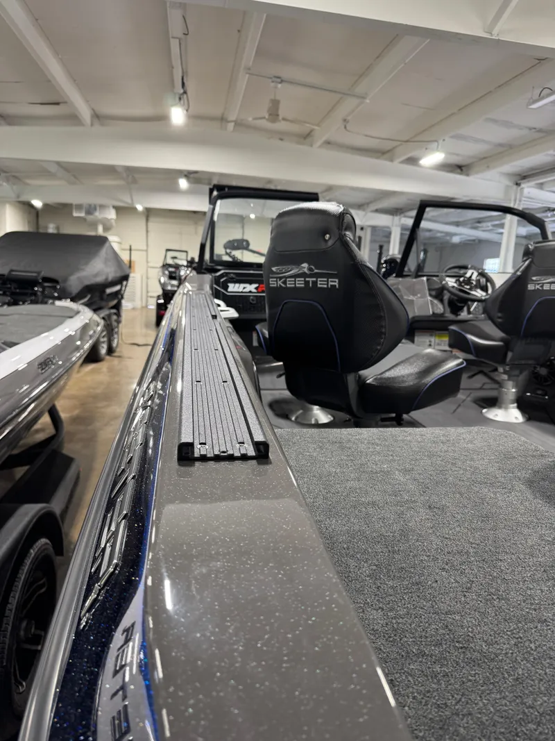 Slide: The Image of 2025 Skeeter WXR 2260 F boat interior with sleek seating and modern design. - 5