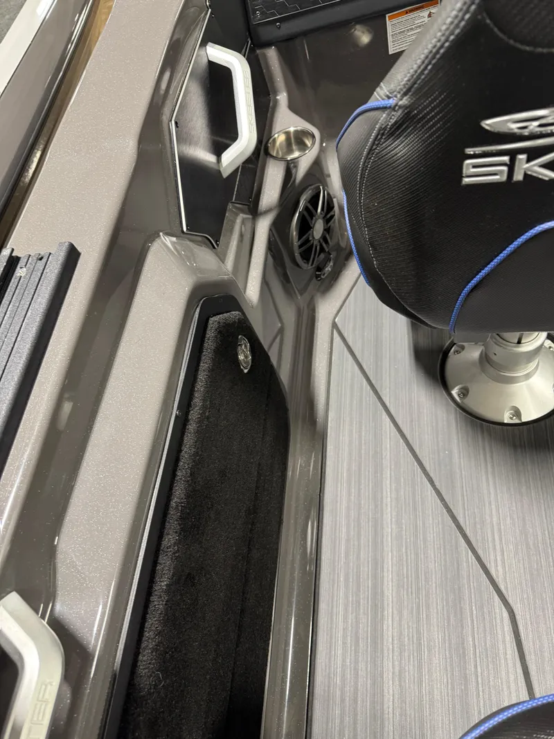 Slide: The Image of 2025 Skeeter WXR 2260 F boat interior with seat and cup holder. - 8