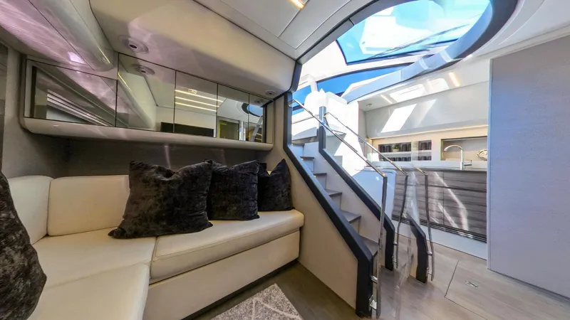 Slide: The Image of Luxurious interior of a 2014 Pershing 62 yacht with modern seating and skylight. - 5