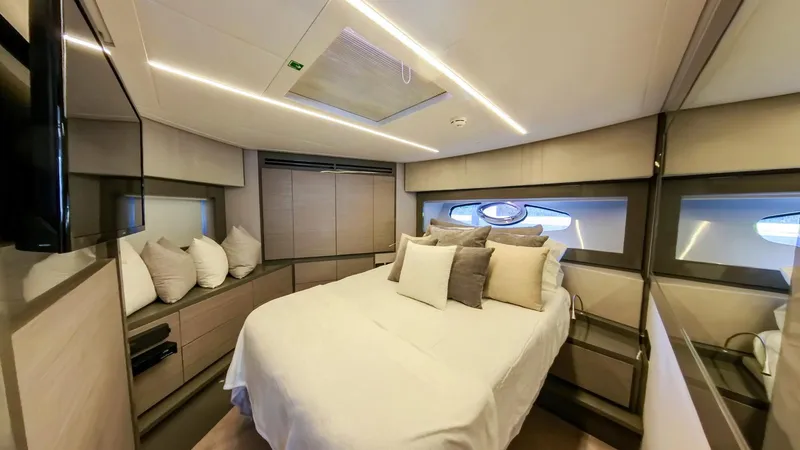 Slide: The Image of Luxurious bedroom interior of 2014 Pershing 62 yacht with modern design and cozy bedding. - 8