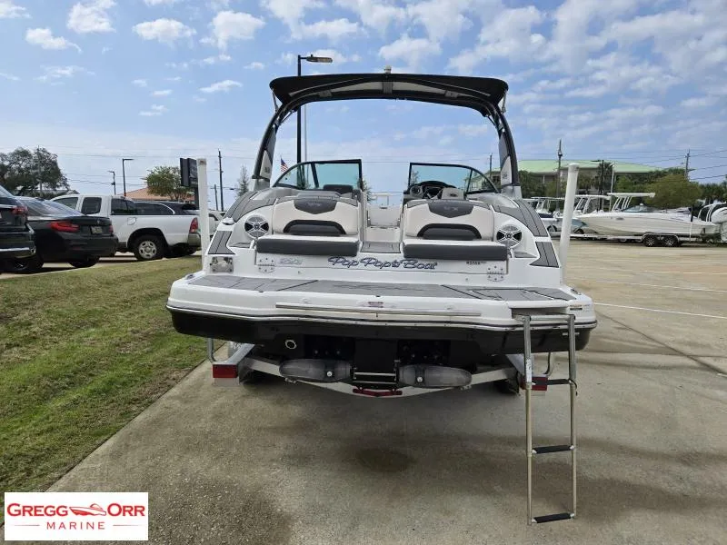 Slide: The Image of 2018 Chaparral 223VRX boat rear view with swim platform and ladder at Gregg Orr Marine. - 12