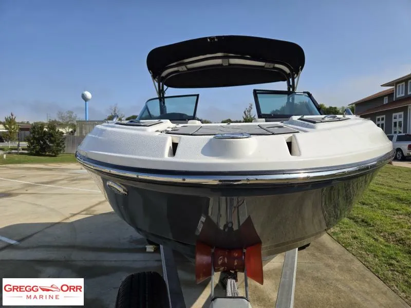 Slide: The Image of 2018 Chaparral 223VRX boat on trailer, front view, outdoor setting. - 4