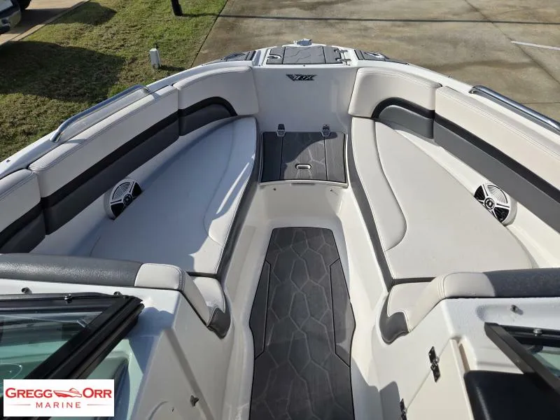 Slide: The Image of 2018 Chaparral 223VRX boat interior with sleek seating and modern design. - 7