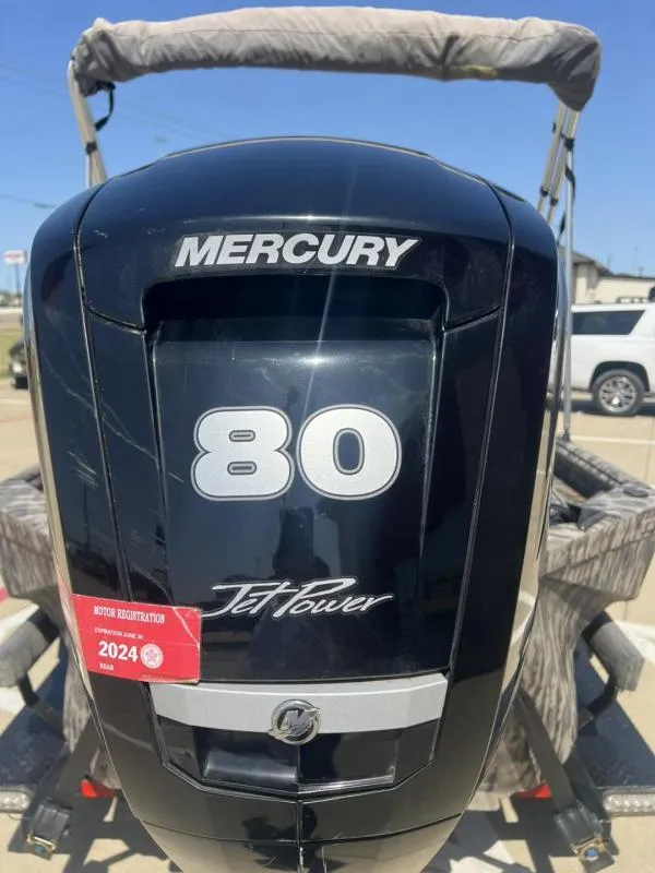 Slide: The Image of Mercury 80 Jet Power engine on 2020 Havoc Boats 1753 RR, with 2024 registration sticker. - 14