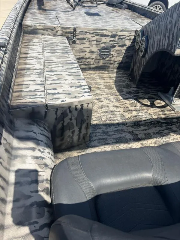 Slide: The Image of 2020 Havoc Boats 1753 RR interior with camouflage design and seating. - 15
