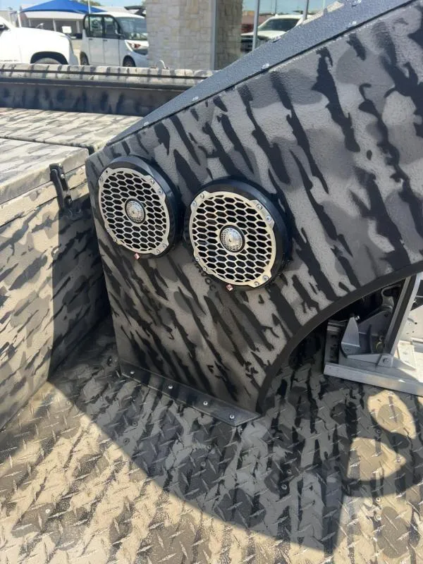 Slide: The Image of 2020 Havoc Boats 1753 RR with camo pattern and dual speakers. - 16
