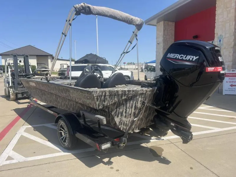 Slide: The Image of 2020 Havoc Boats 1753 RR with Mercury engine, parked outdoors on a trailer. - 3