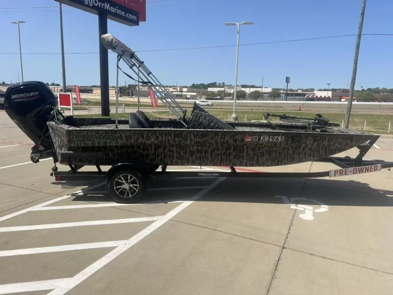 Slide: The Image of 2020 Havoc Boats 1753 RR on trailer, camo design, pre-owned, with Mercury outboard motor. - 6