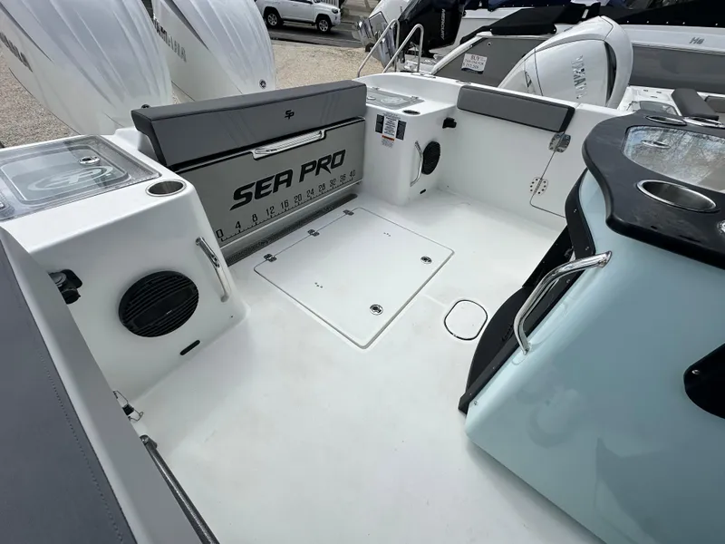 Slide: The Image of 2025 Sea Pro 292 Offshore boat interior with modern features and spacious deck. - 12
