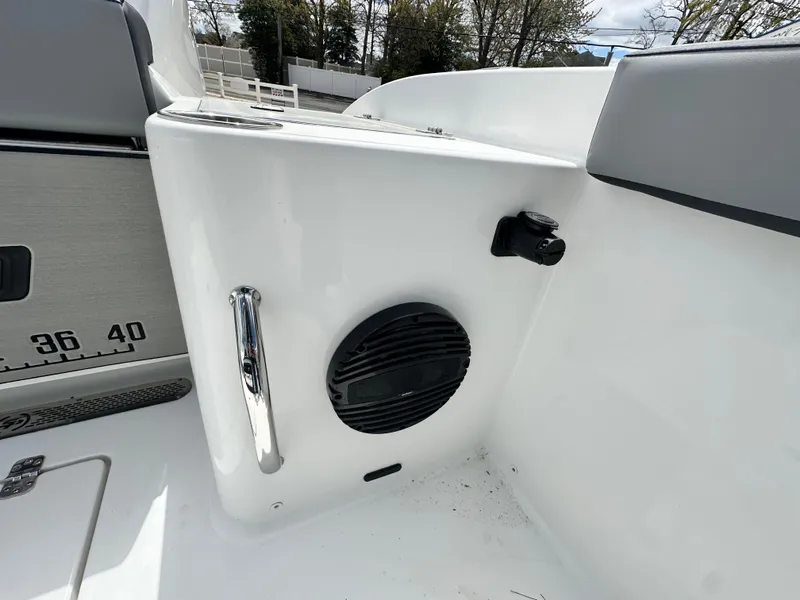 Slide: The Image of 2025 Sea Pro 292 Offshore boat interior with speaker and handle detail. - 16