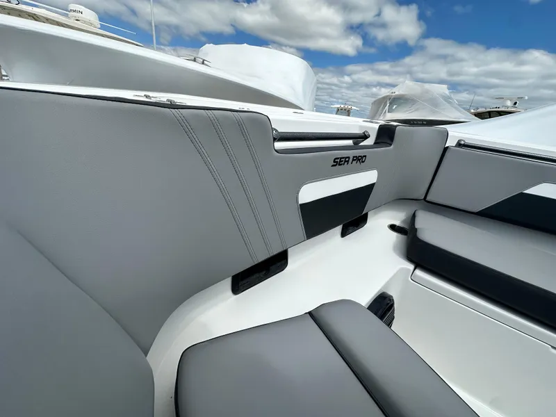 Slide: The Image of 2025 Sea Pro 292 Offshore boat interior with sleek seating and modern design. - 45
