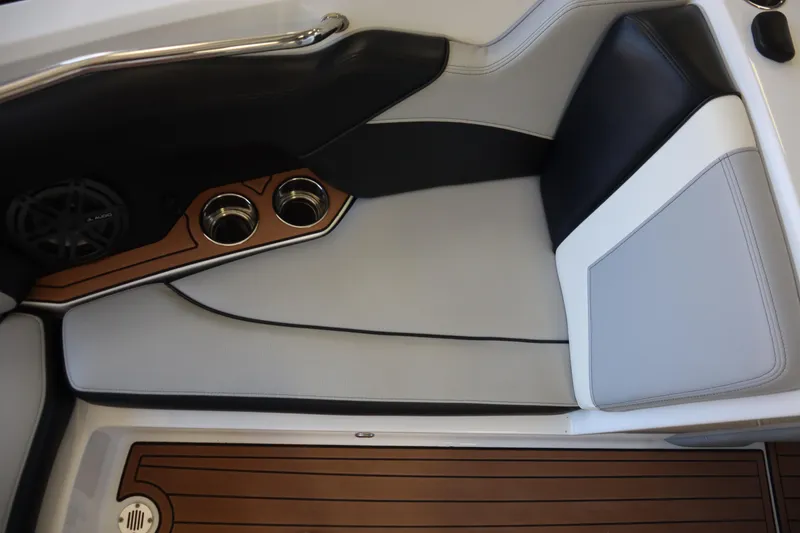 Slide: The Image of Interior of 2020 Nautique Super Air Nautique 230 with sleek seating and cup holders. - 7