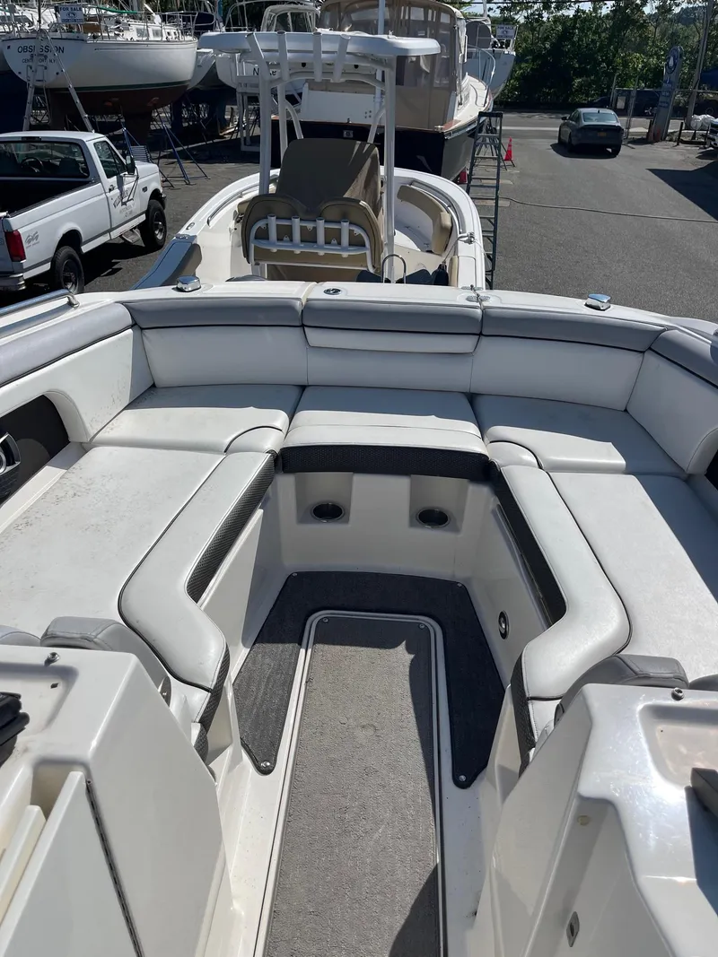 Slide: The Image of 2016 Sea Ray 290 Sundeck boat interior with spacious seating and modern design. - 18
