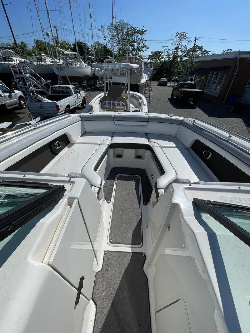 Slide: The Image of 2016 Sea Ray 290 Sundeck boat interior with spacious seating and sleek design. - 19