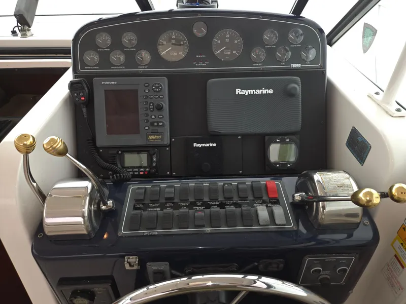 Slide: The Image of Control panel of a 2002 Tiara Yachts 3500 Open Hardtop with navigation instruments. - 15