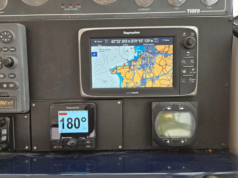Slide: The Image of Navigation system on 2002 Tiara Yachts 3500 Open, displaying map and compass data. - 17