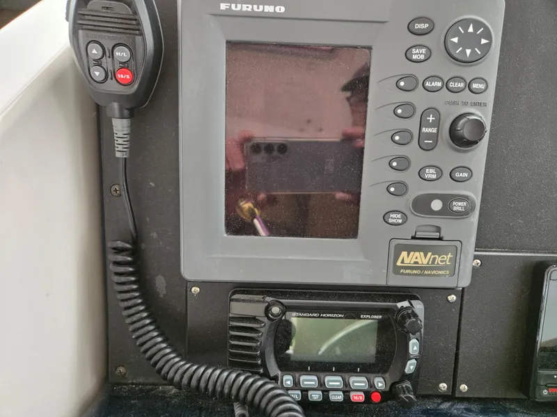 Slide: The Image of Control panel of a 2002 Tiara Yachts 3500 Open with Furuno navigation system. - 18