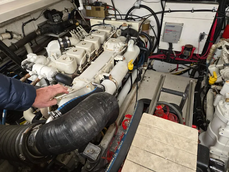 Slide: The Image of Engine room of a 2002 Tiara Yachts 3500 Open, showcasing detailed mechanical components. - 36