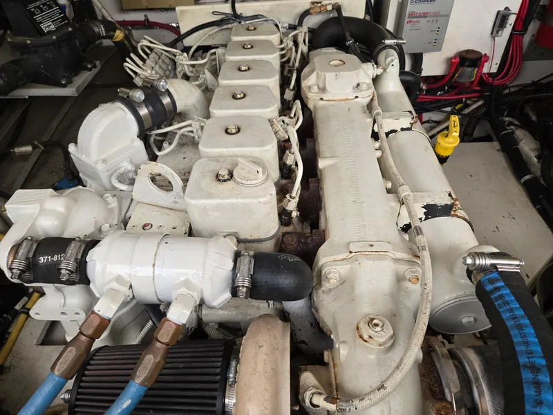 Slide: The Image of Engine of a 2002 Tiara Yachts 3500 Open, showcasing detailed mechanical components. - 37