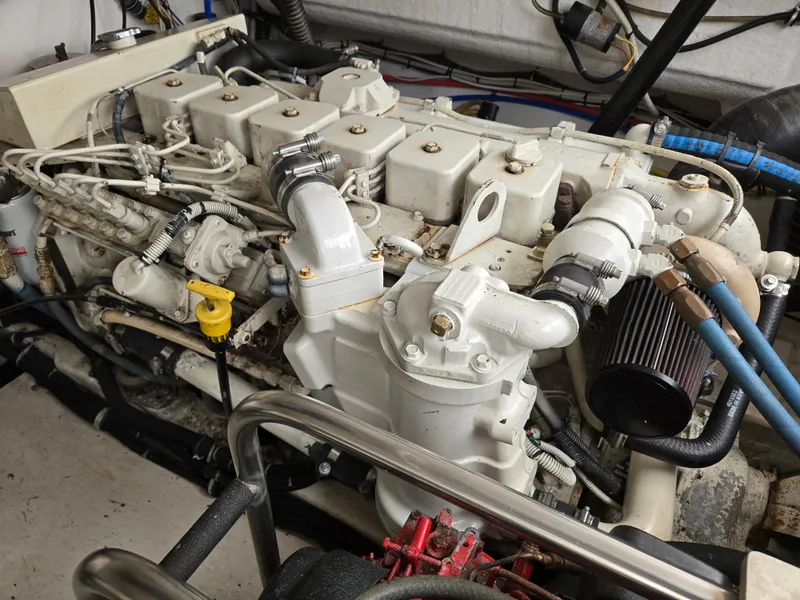 Slide: The Image of Engine of 2002 Tiara Yachts 3500 Open, showcasing detailed mechanical components. - 38
