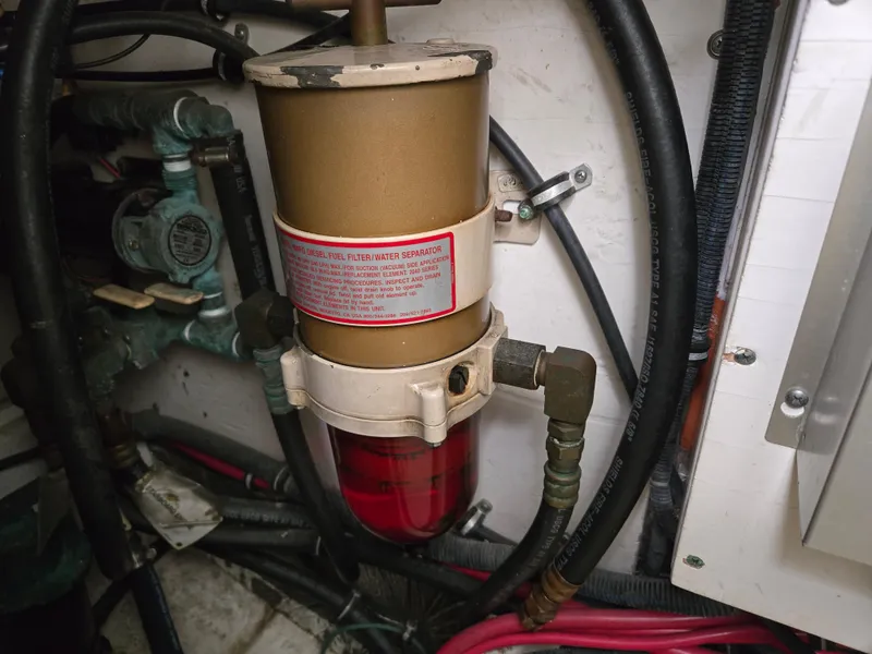 Slide: The Image of Fuel filter system in a 2002 Tiara Yachts 3500 Open engine compartment. - 42