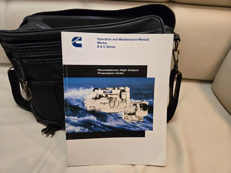 Slide: The Image of Operation manual for marine propulsion unit on a Tiara Yachts 3500 Open Hardtop, 2002 model. - 49