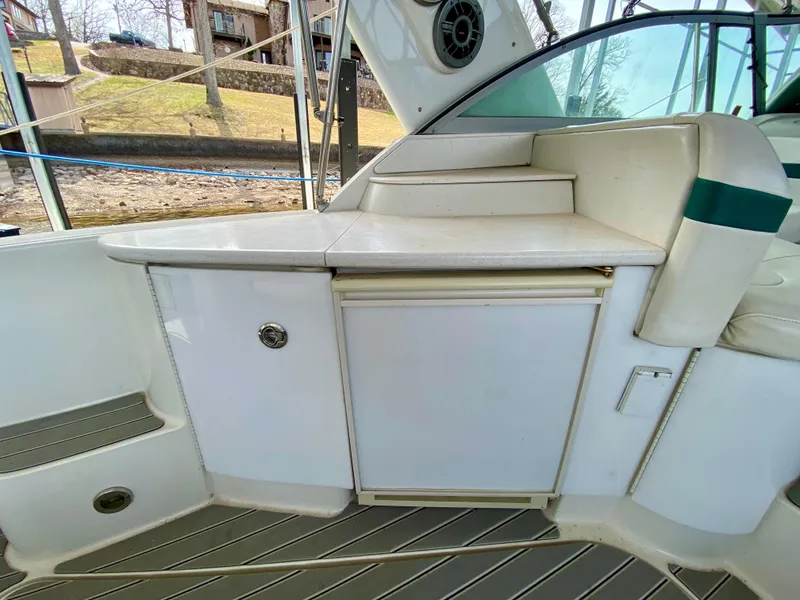 Slide: The Image of 1998 Formula 41 PC yacht interior with white cabinetry and seating. - 16