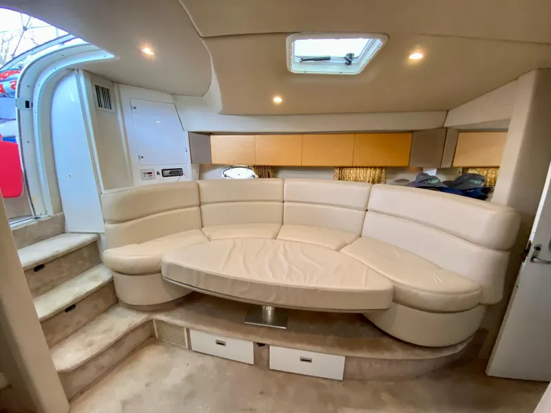 Slide: The Image of Luxurious interior of a 1998 Formula 41 PC yacht with plush seating and modern design. - 21