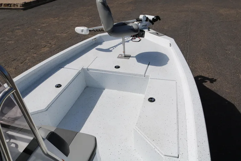 Slide: The Image of 2022 Xpress H22B boat deck with seating and mounted equipment. - 12