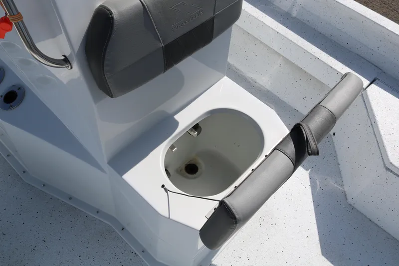 Slide: The Image of 2022 Xpress H22B boat interior with seating and storage compartment. - 20