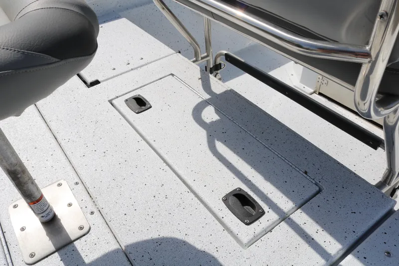 Slide: The Image of 2022 Xpress H22B boat interior with storage compartment and seating. - 30