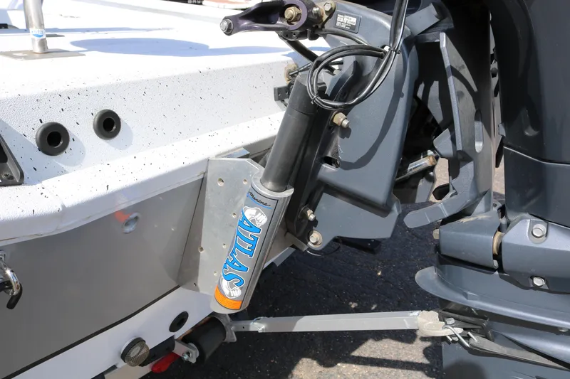 Slide: The Image of 2022 Xpress H22B boat with Atlas hydraulic jack plate detail. - 9