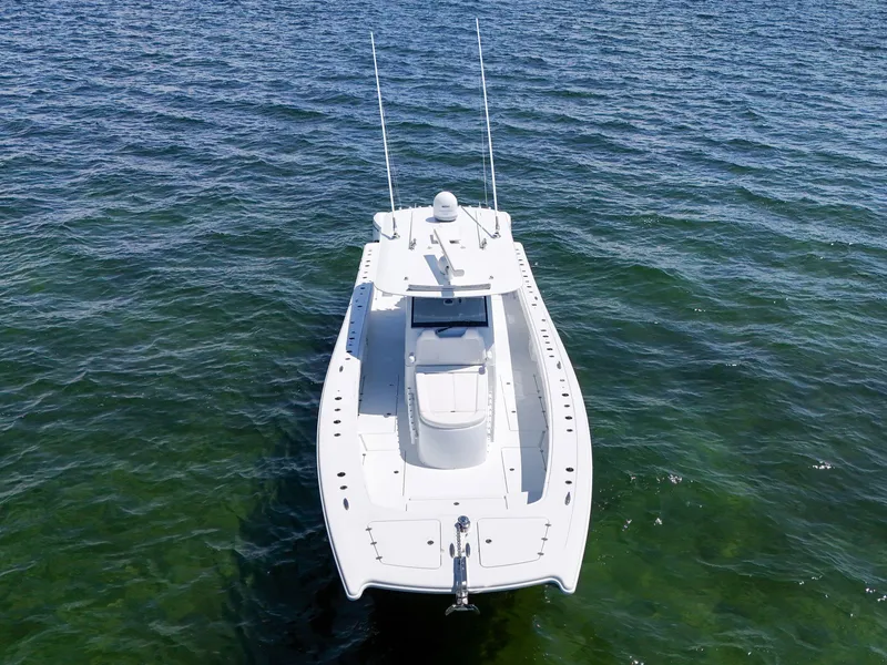 Slide: The Image of 2023 Freeman 47 boat on open water, aerial view. - 15